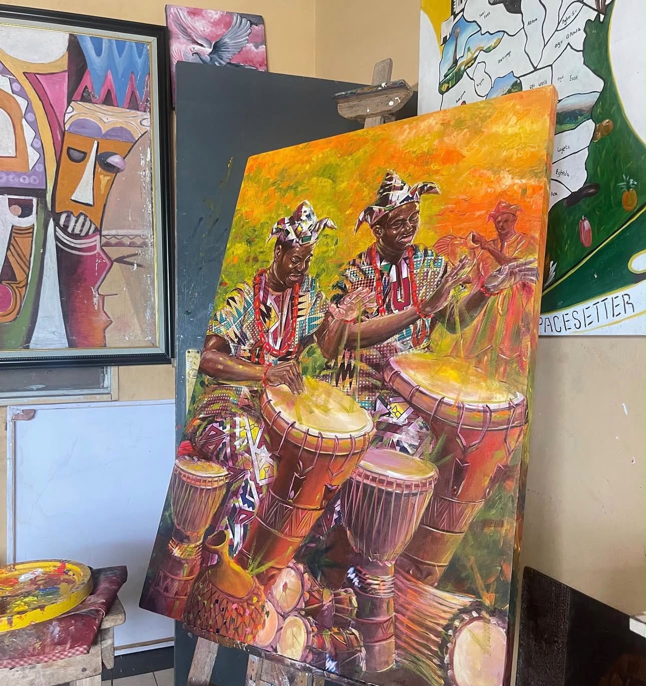 Painting by the artist in the studio